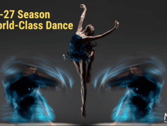 Ballet dancer performing leap with dynamic blue light effects.